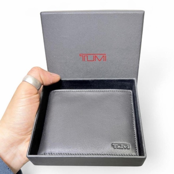 Tumi Other - Tumi black leather wallet